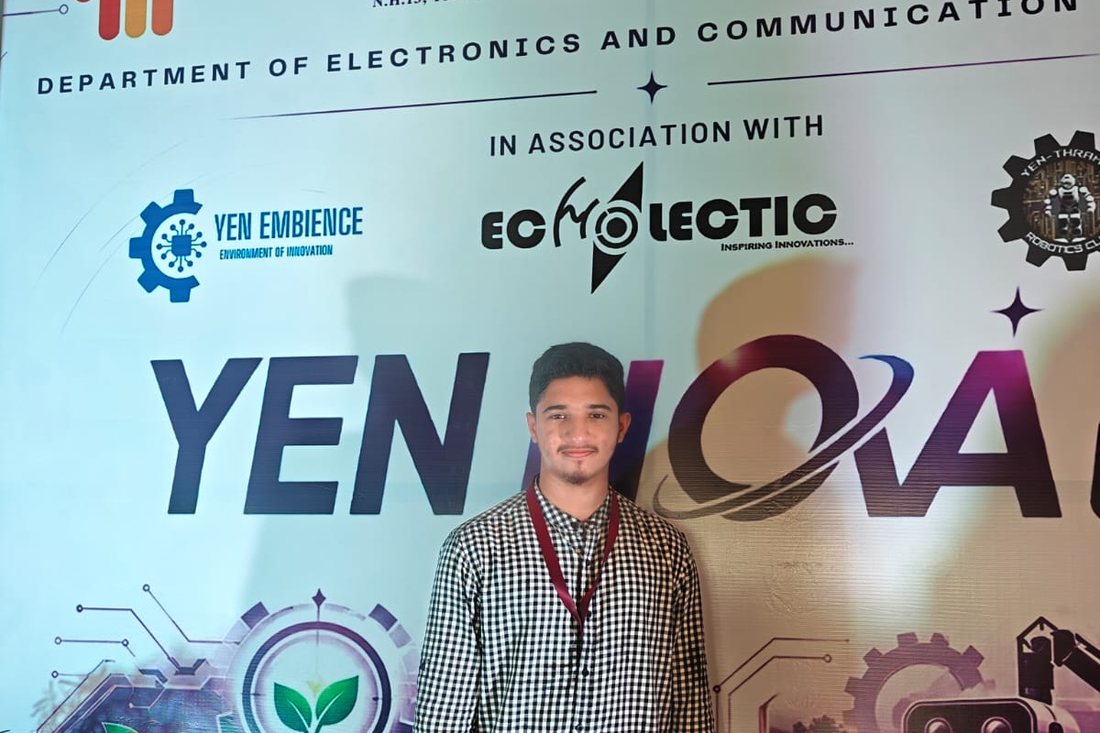 At the YEN NOVA 1.0 backdrop.