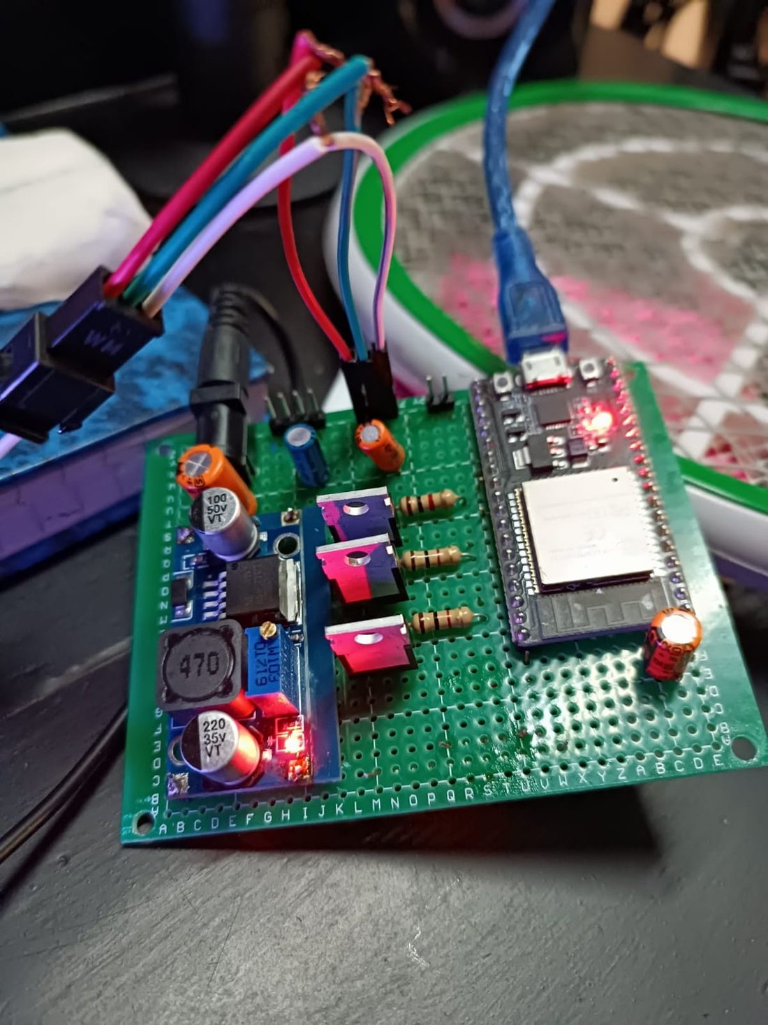 Hand-soldered on protoboard. Three MOSFET channels, one per colour.